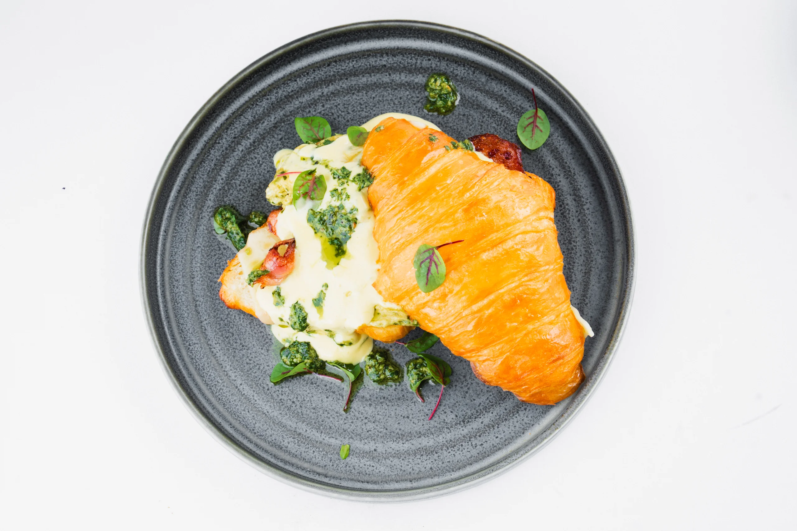 Pesto Scrambled Eggs on Croissant
